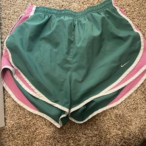 Pink and green Nike shorts